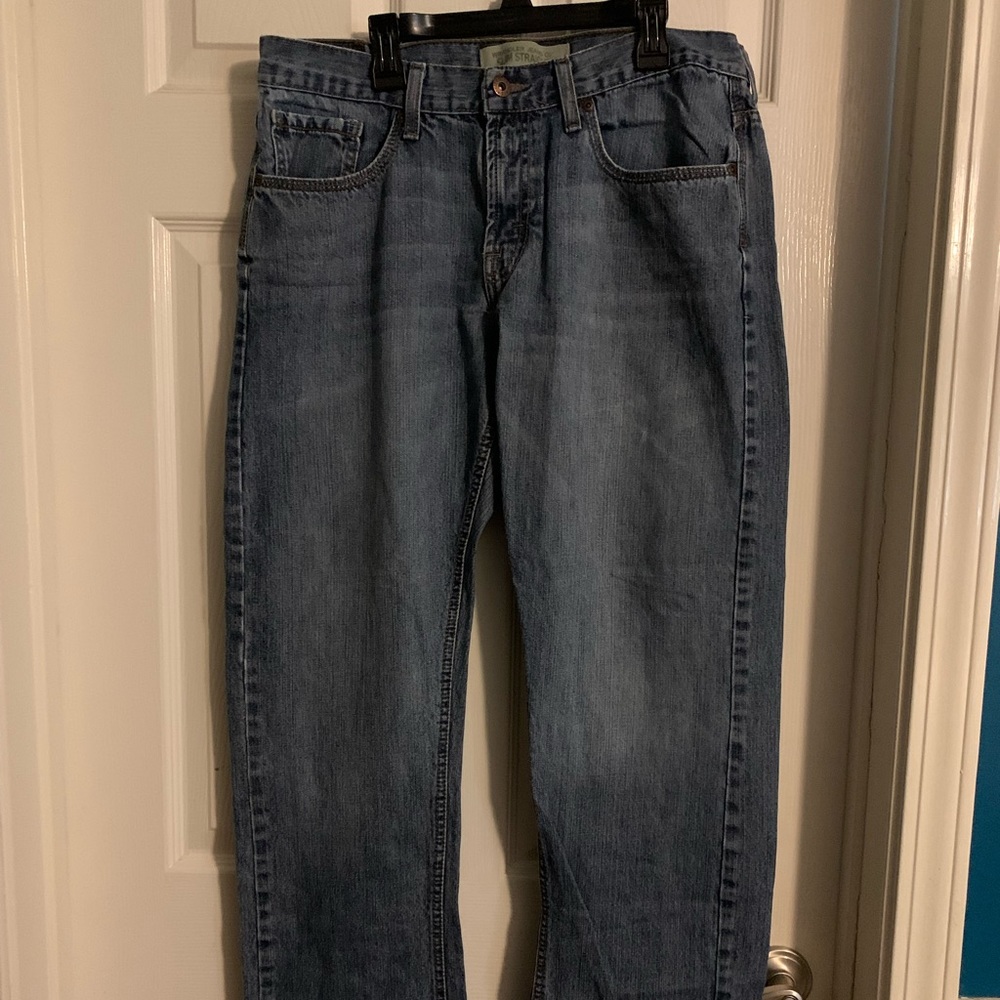 Wrangler Slim Straight Cut Jeans.